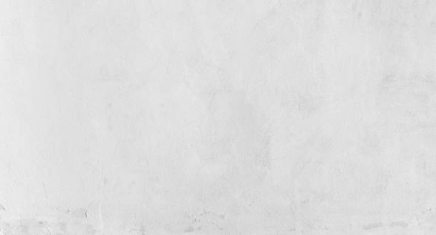 Empty white concrete wall texture Empty white concrete wall, wide frontal background photo texture whitewashed stock pictures, royalty-free photos & images