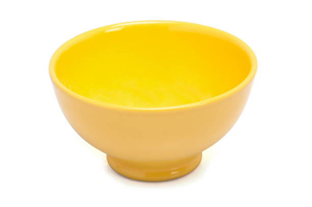 Empty Yellow Bowl On White Background stock photo