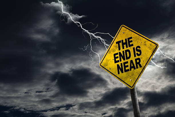 End is Near Sign With Stormy Background End is Near sign against a stormy background with lightning and copy space. Dirty and angled sign adds to the drama. apocalypse stock pictures, royalty-free photos & images