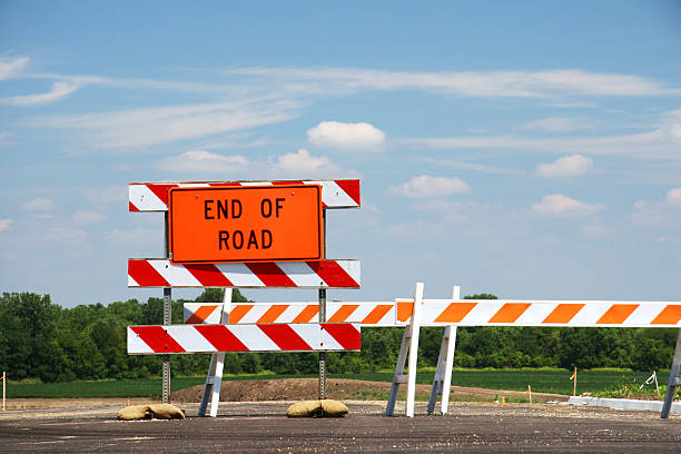 End Of Road Sign 1 End Of Road Sign. Problems. Despair. No more options. dead end road stock pictures, royalty-free photos & images