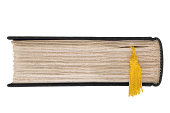 istock End view of old hardcover book with golden tassels bookmark 185282220