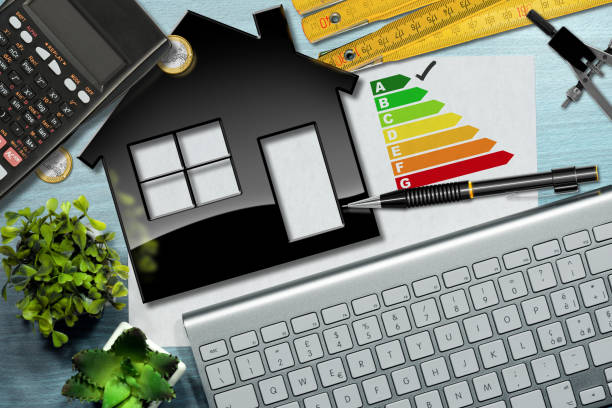Energy Efficiency Rating with House Model stock photo