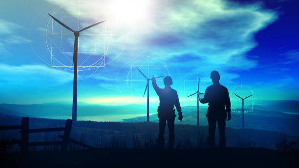 Engineers design the construction of wind farms. stock photo