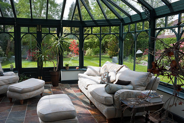 English Conservatory Sunroom with Modern Furniture stock photo