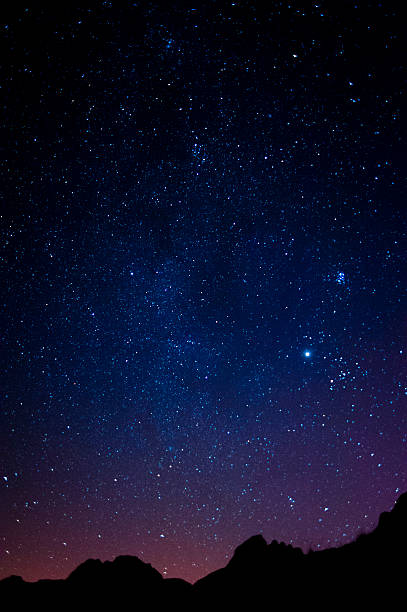 English Lake District: starry night sky over Ambleside stock photo