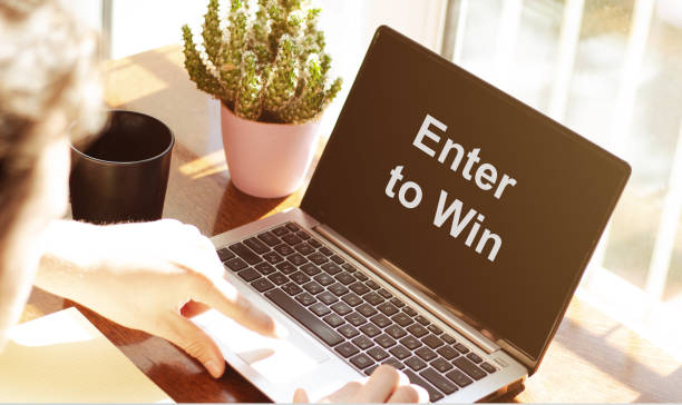 Enter to win. / Enter to win sign on chalkboard Enter to win. / Enter to win sign on chalkboard incentive photos stock pictures, royalty-free photos & images