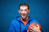 Portrait of a mid adult basketball fan