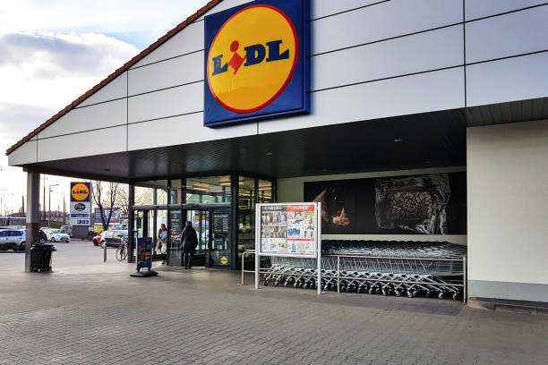 Entrance of the Lidl Store Nowy Sacz, Poland - March 20, 2019: Exterior view of the Lidl Store. Lidl is a large German global discount supermarket chain based in Neckarsulm. lidl stock pictures, royalty-free photos & images