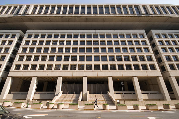 entrance to federal bureau of investigation fbi building washington dc - fbi stok fotoğraflar ve resimler