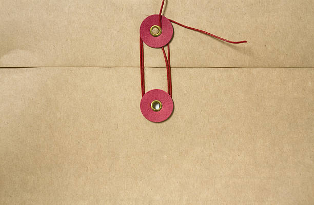 Envelope sealed with rope stock photo