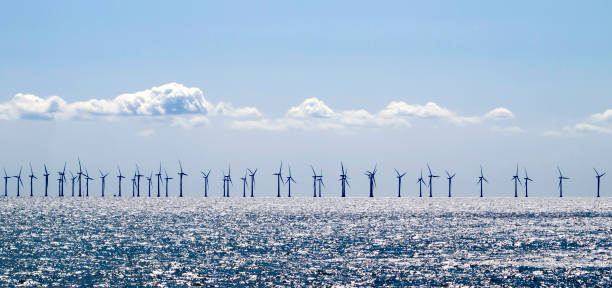 Environment Wind farm on the Öresund between Sweden and Denmark. vertical axis wind turbine stock pictures, royalty-free photos & images