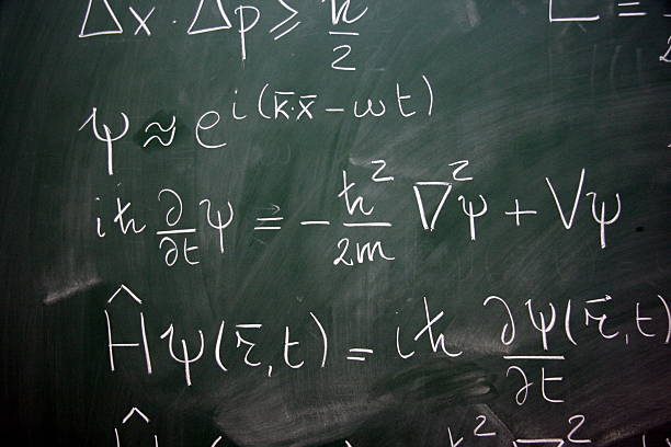 equations on a blackboard quatum equations on a blackboard physics photos stock pictures, royalty-free photos & images