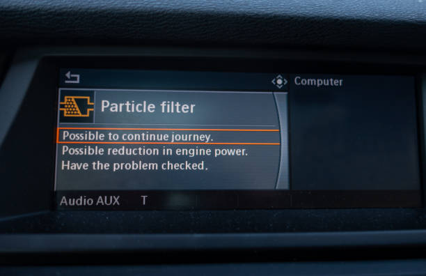 Error message from the cars on board computer warning that diesel particulate filter has problem Error message from the cars on board computer warning that diesel particulate filter has problem and the power is reduced diesel fuel stock pictures, royalty-free photos & images