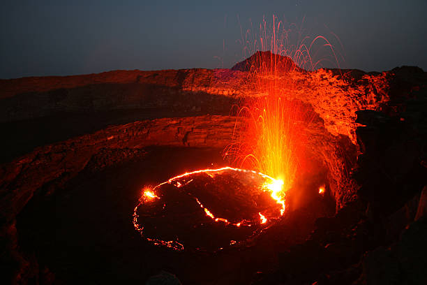 Erta Ale volcano with eruption stock photo