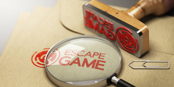 Escape Room, Adventure Game Concept Kraft envelop with enigma inside and the word escape game stamped on it. escaping stock pictures, royalty-free photos & images