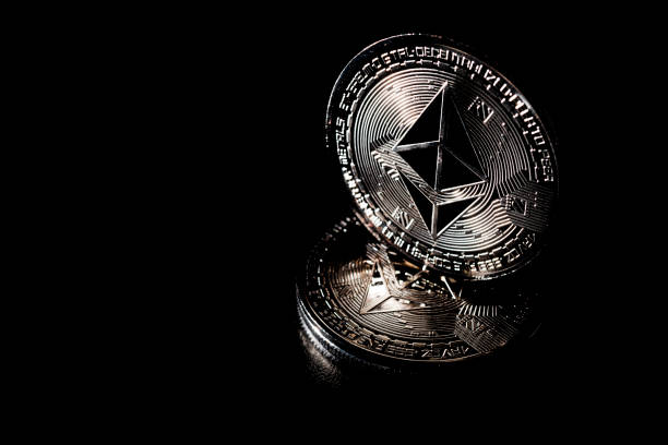 Ethereum metal physical currency concept. Cryptocurrency concepts on black background stock photo