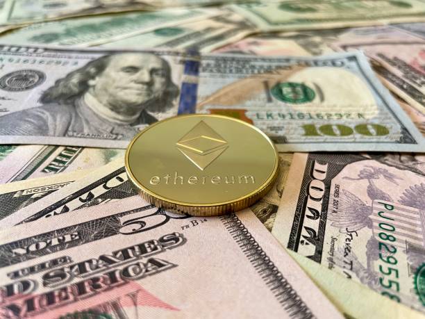 Ethereum Ethereum on U.S Currency investments Background. Digital currency used for verified transactions while  maintaining a digital record in  a decentralized system using cryptography, rather than by a centralized authority.  With Ethereum  stock pictures, royalty-free photos & images