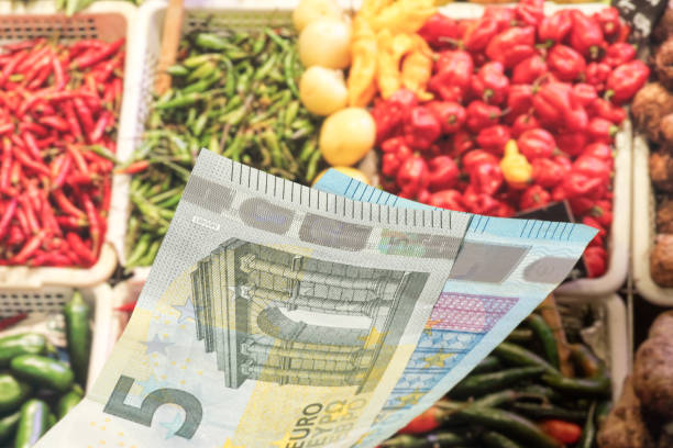 Euro banknotes and food stock photo