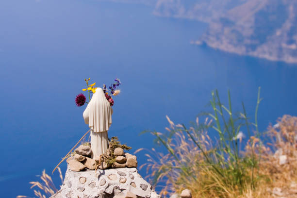 Europe Path of the Gods Mary Statue Overlooking Ocean stock photo