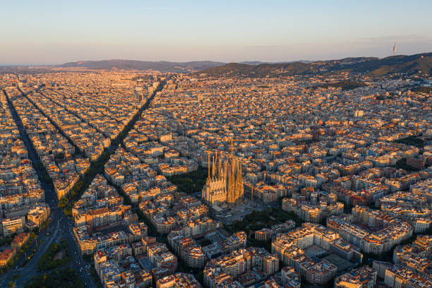 European Architecture City Lines aerial view of Barcelona at first light on the famous Sagrada familia barcelona spain stock pictures, royalty-free photos & images