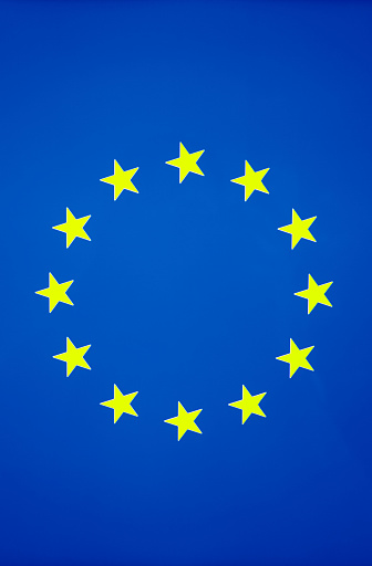 European Union flag near plan photo