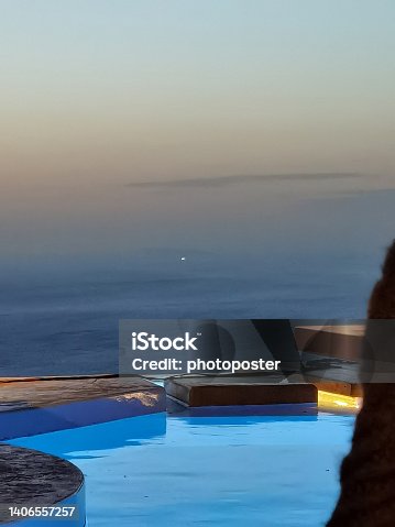 istock Evening atmosphere by the pool 1406557257