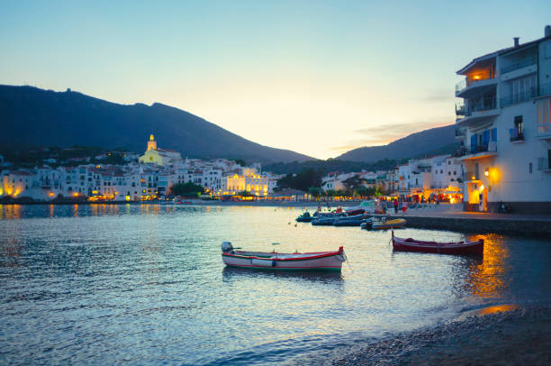 Evening in Cadaques, Catalonia. Boats moored in Cadaques in Catalonia, Spain. fishing village stock pictures, royalty-free photos & images