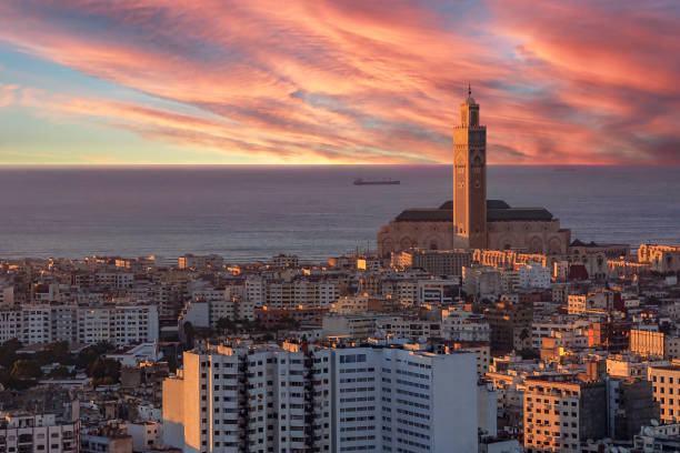 Evening view of Casablanca cityscape with Mosque Hassan II in Morocco stock photo