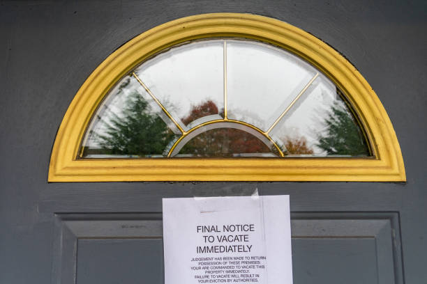 Eviction Final Notice to Vacate Immediately on House Door stock photo