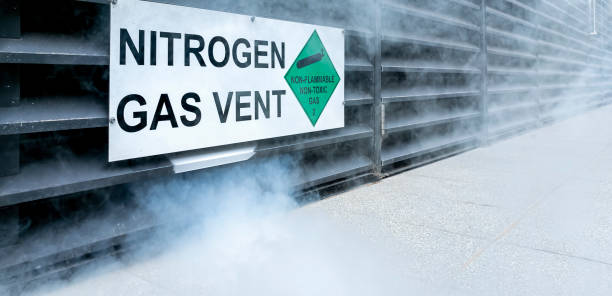 Excess white nitrogen gas fumes safely and harmlessly released to atmosphere stock photo