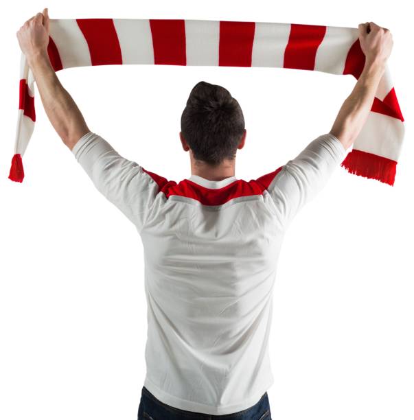 Excited football fan cheering Excited football fan cheering on white background Ireland Soccer stock pictures, royalty-free photos & images