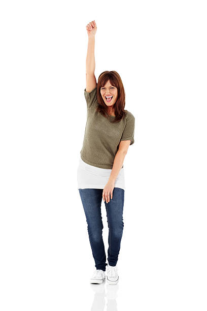 Excited mature woman rejoicing success stock photo