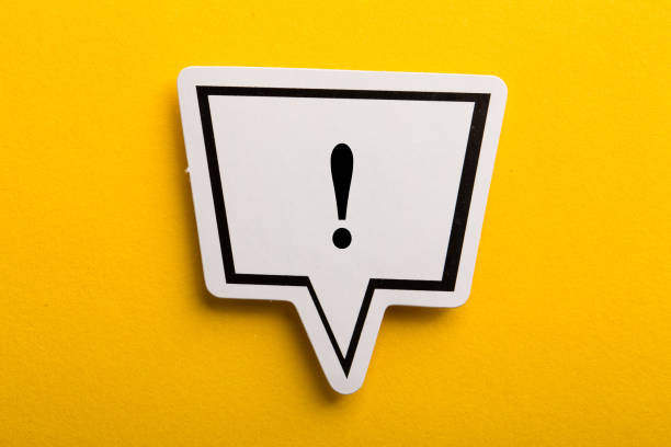 Exclamation Mark Speech Bubble Isolated On Yellow Exclamation Mark speech bubble isolated on yellow background. beat the clock stock pictures, royalty-free photos & images