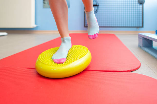 Exercises for ankle proprioception in a physiotherapy study stock photo