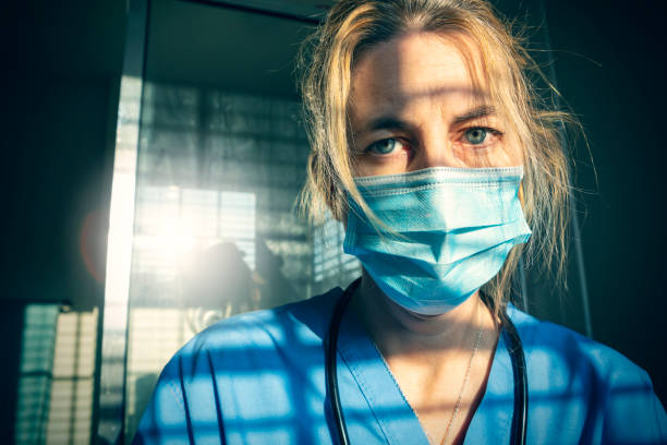 Exhausted Medical Worker stock photo