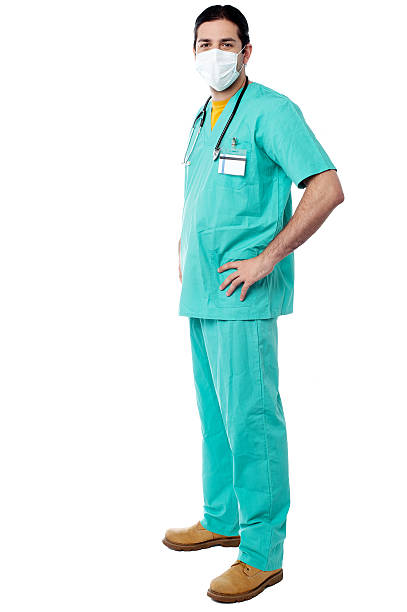 Experienced surgeon with hands on his waist stock photo