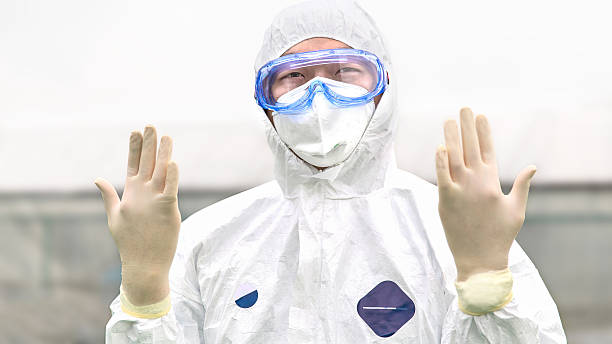 CDC Expert in a Hazmat Suit stock photo