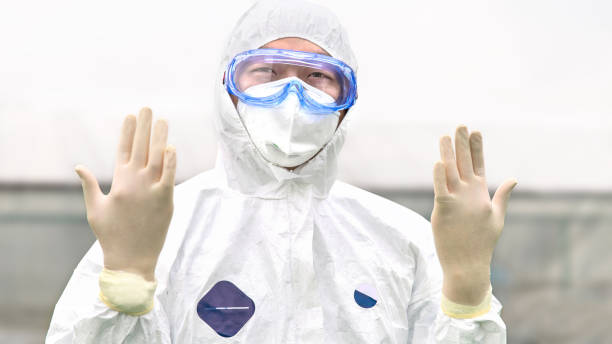 CDC Expert in a Hazmat Suit stock photo