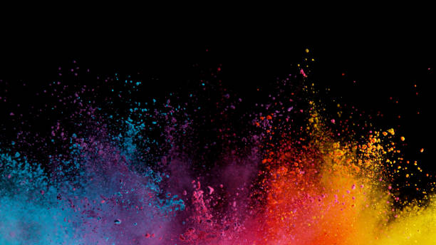 explosion of colored powder on black background - imagem a cores imagens e fotografias de stock
