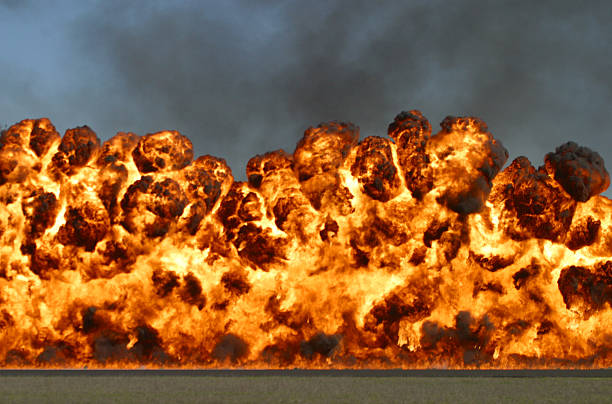 Explosive wall of fire and smoke stock photo