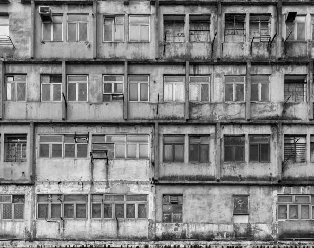 Exterior of abandoned residential building in Hong Kong city stock photo