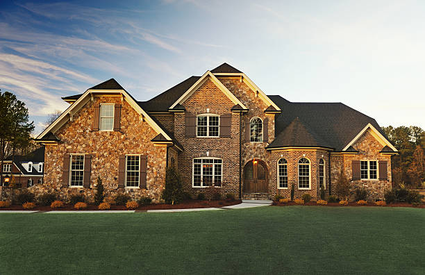 Exterior Residential House Beautiful Home Exterior at sunset brick house stock pictures, royalty-free photos & images