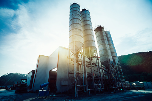 Exterior View Of A Cement Factory Stock Photo - Download Image Now - iStock