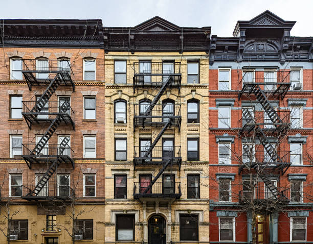 Exterior view of old brick apartment buildings in the East Village neighborhood of New York City stock photo