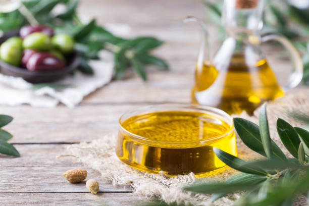 Extra virgin olive oil on a table stock photo