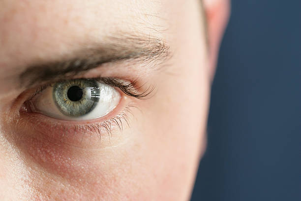 Extreme Close up of a man's eye stock photo