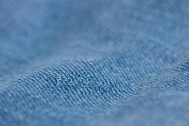 extreme closeup of blue jeans fabric stock photo