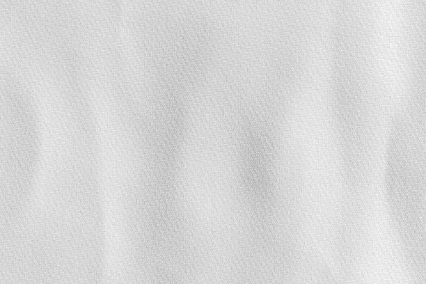 Fabric background with a white fabric cloth polyester texture. stock photo