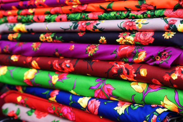 Fabric in rolls Fabric in rolls backgrounds saturated color stock pictures, royalty-free photos & images