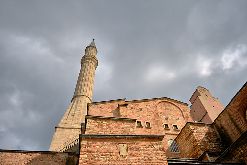 Turkey istanbul 03.03.2021. Facade Hagia sophia mosque, church or museum (ayasofya camii) in istanbul and its minaret extends to cloudy sky.
